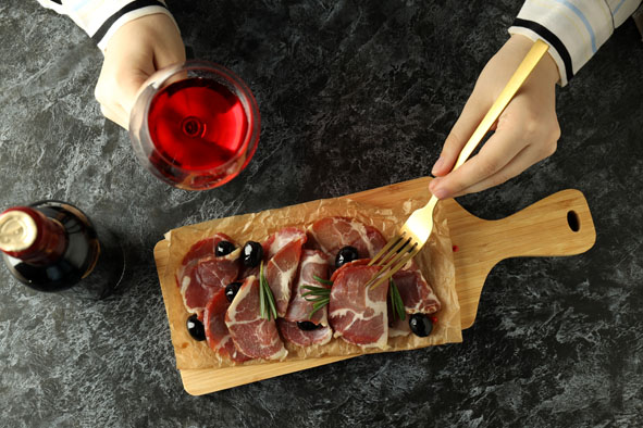 Concept of delicious food with jamon, top view