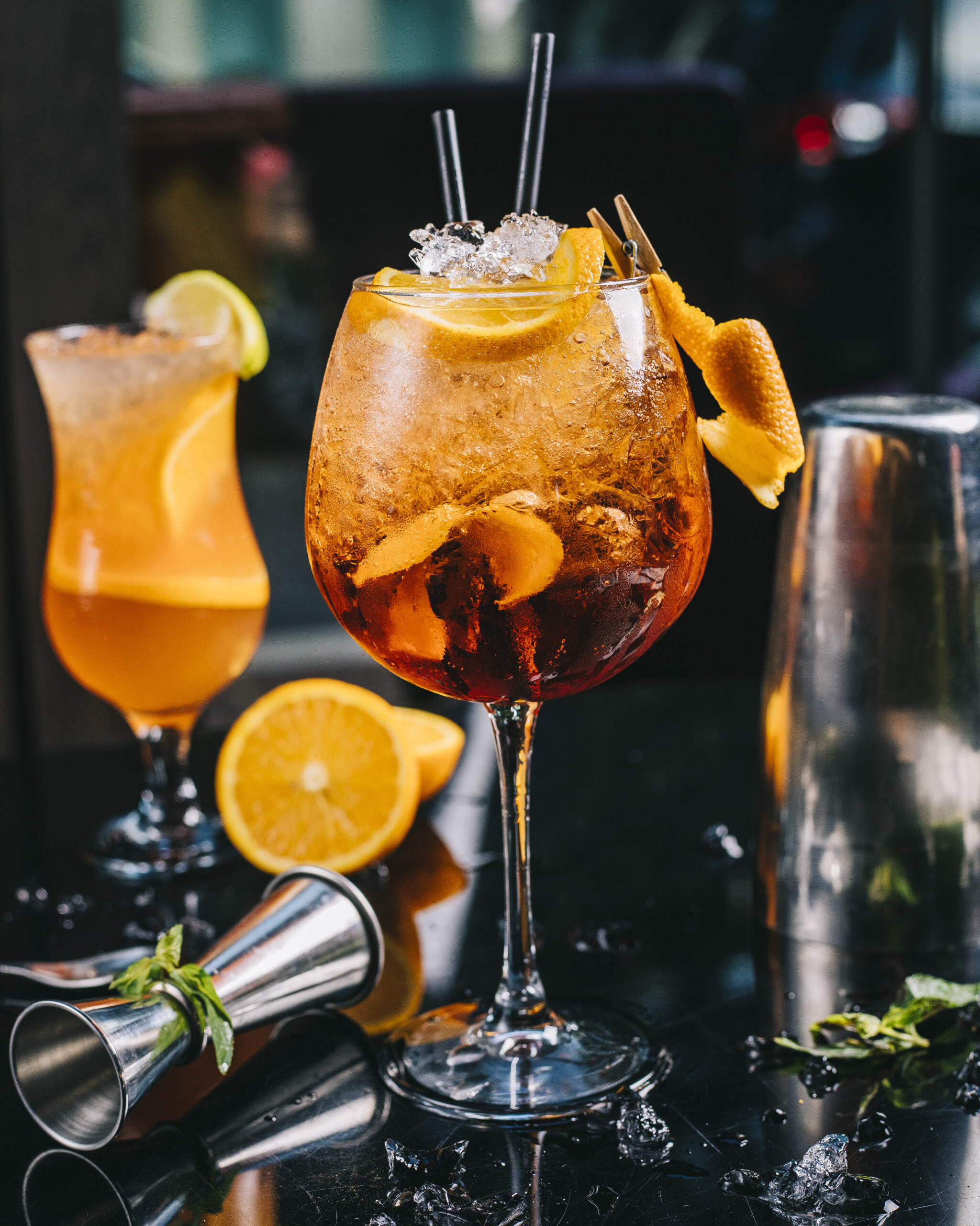 cocktail topped with orange slice